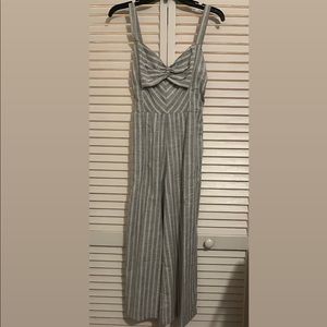 Grey with white lines. New with tag, never been used